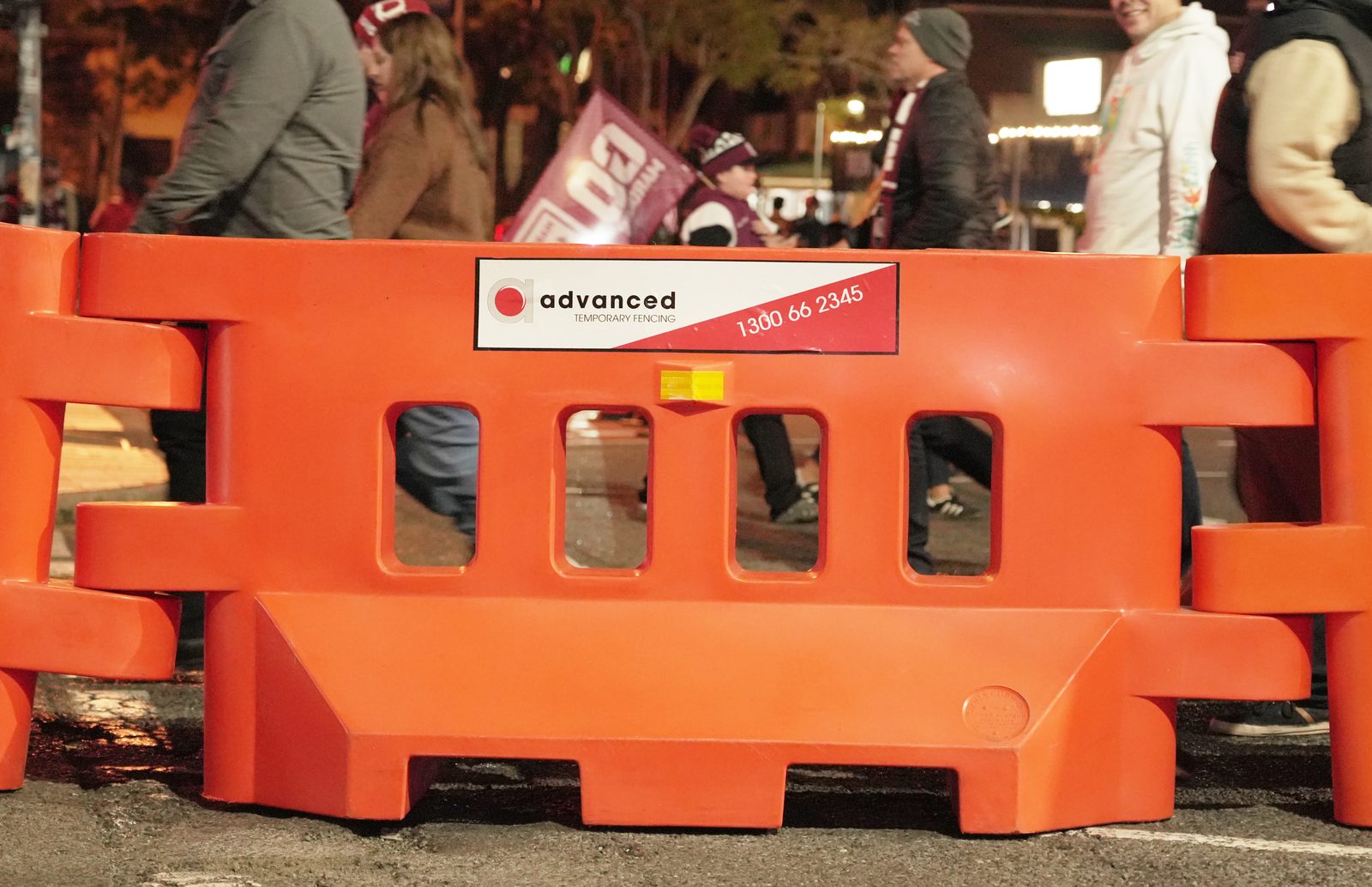 Water-filled barriers delineating traffic at an event