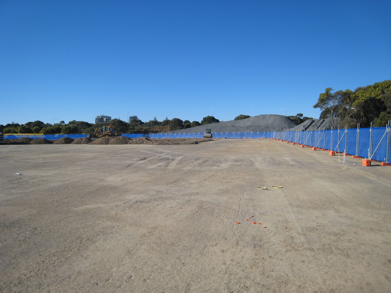 Temporary mesh fencing securing a construction site